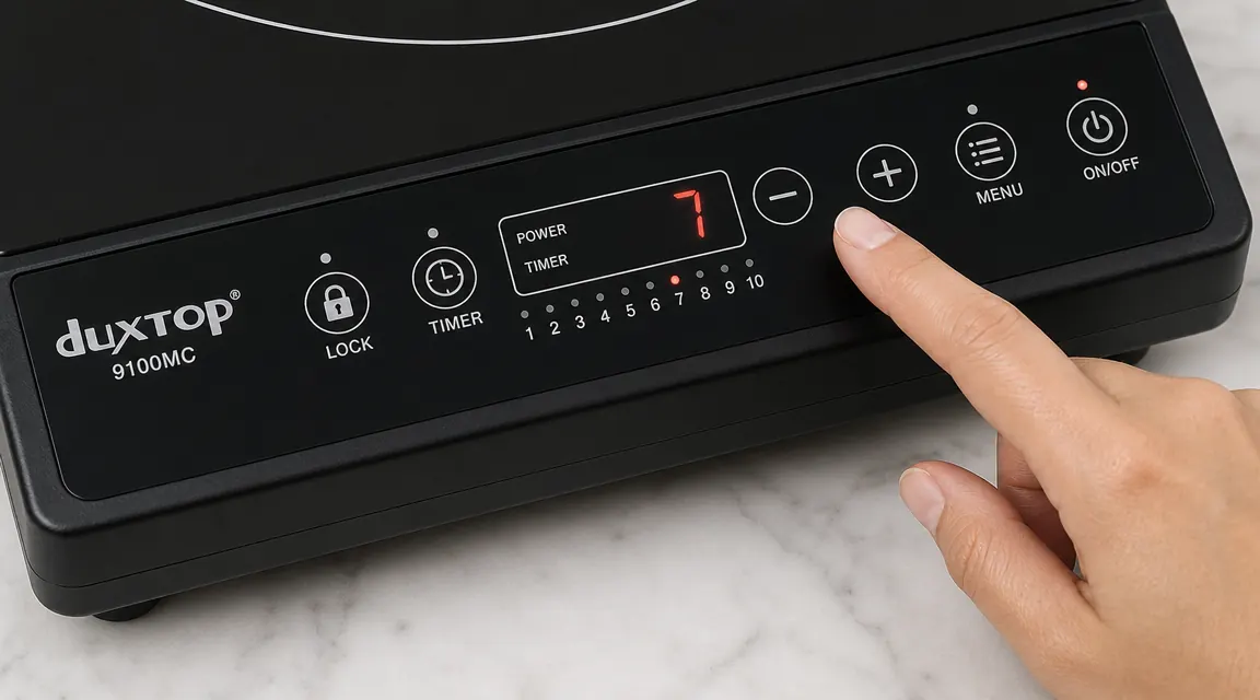 Close-up of the Duxtop 9100MC sensor touch control panel showing power level and temperature settings